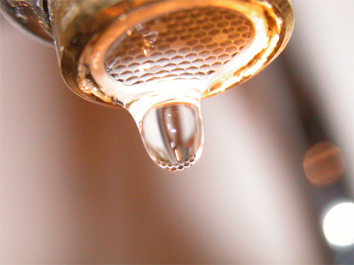 water faucet macro