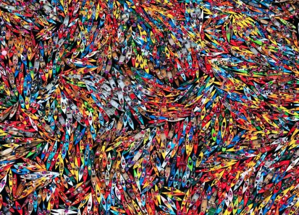 On Fourth Lake in New York's Adirondacks, a crush of 1,902 canoes and kayaks attempts to break a "largest raft" world record. (Photograph by Nancie Battaglia)